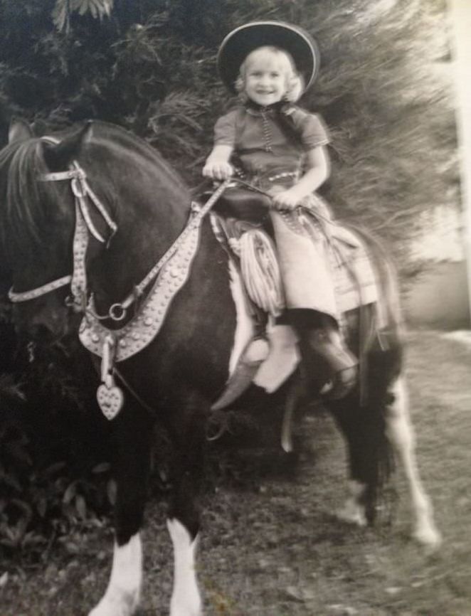 #68 Having my picture taken by a traveling photographe with a horse 1965