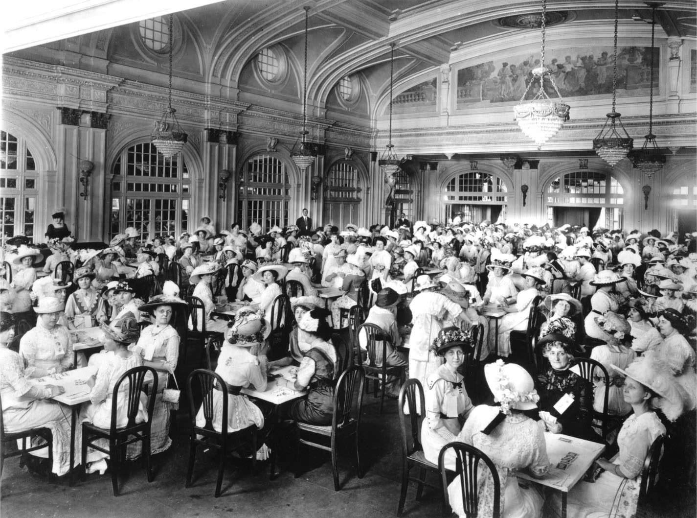 #62 Large ladies’ bridge party in the ballroom of the Rice Hotel, Houston, 1930s.