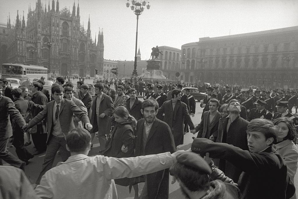 #72 Italian students of the Parini high school demonstrating in piazza Duomo, Milan, 1960s.