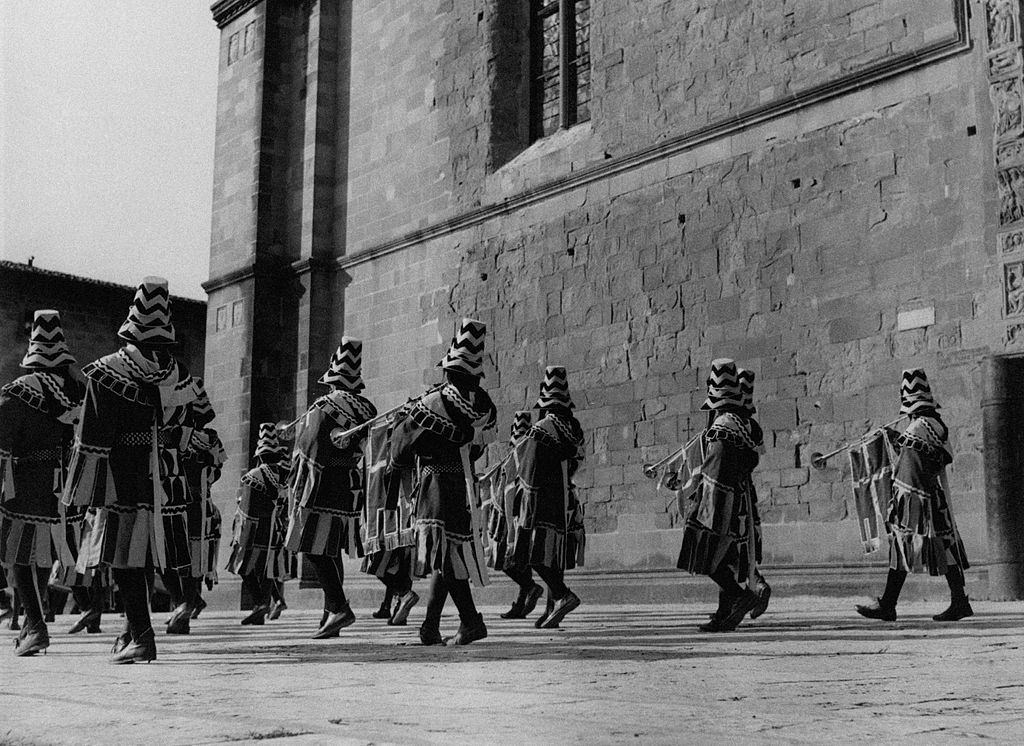 #75 Trumpeters running through the streets of the city during the Saracen Joust, Arezzo, 1960s.