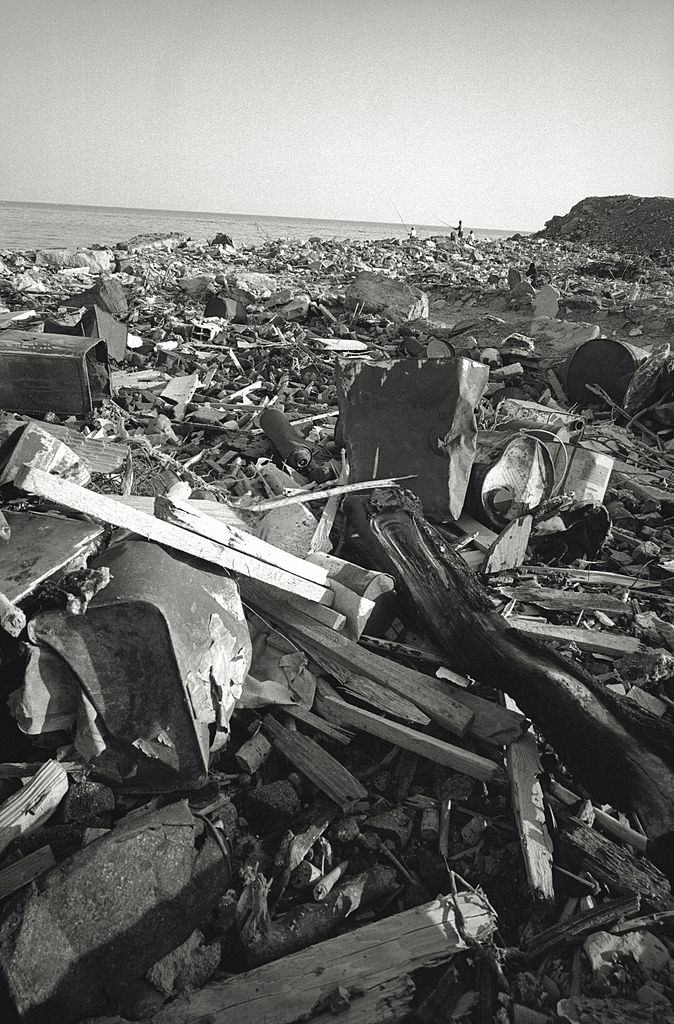 #78 The cliffs of Quinto al Mare covered with trash, 1960s.
