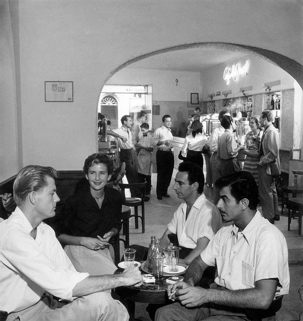 #6 People relaxing at the Baretto on via del Babuino, Rome, 1960s.