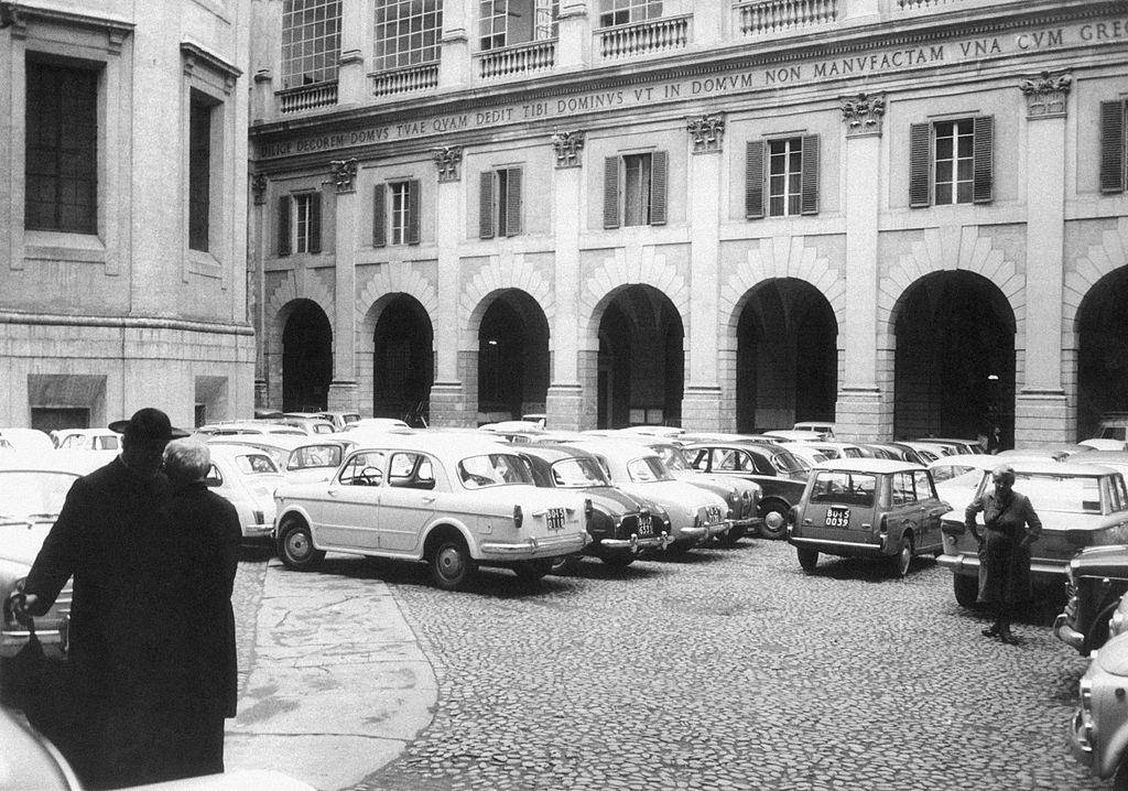#24 Cars parked in the courtyard of Archbishop’s palace in Bologna, 1960s.