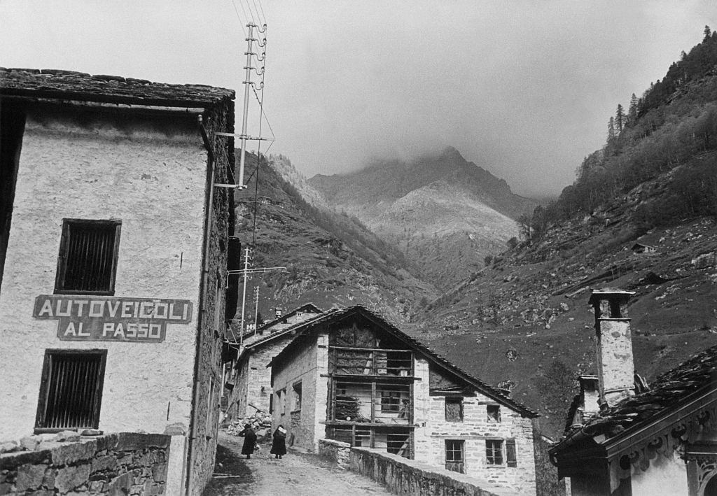 #2 Two women walking in a street of the ancient village of Carcoforo, 1960s.