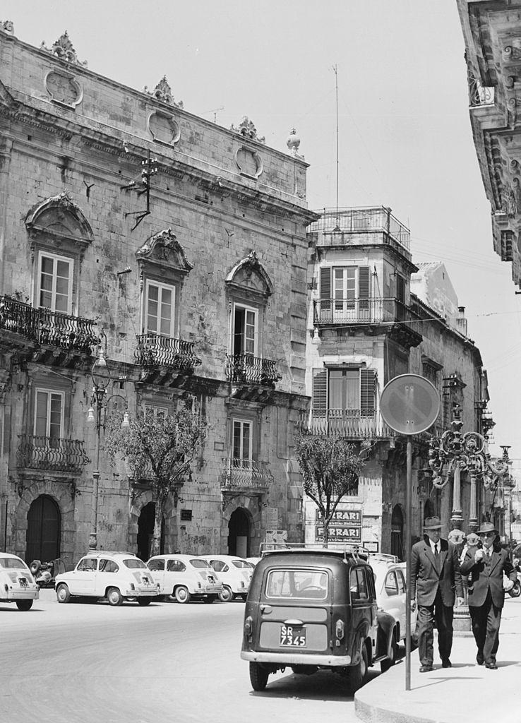 #40 Grand old buildings in a street in Sicily, 1960s.