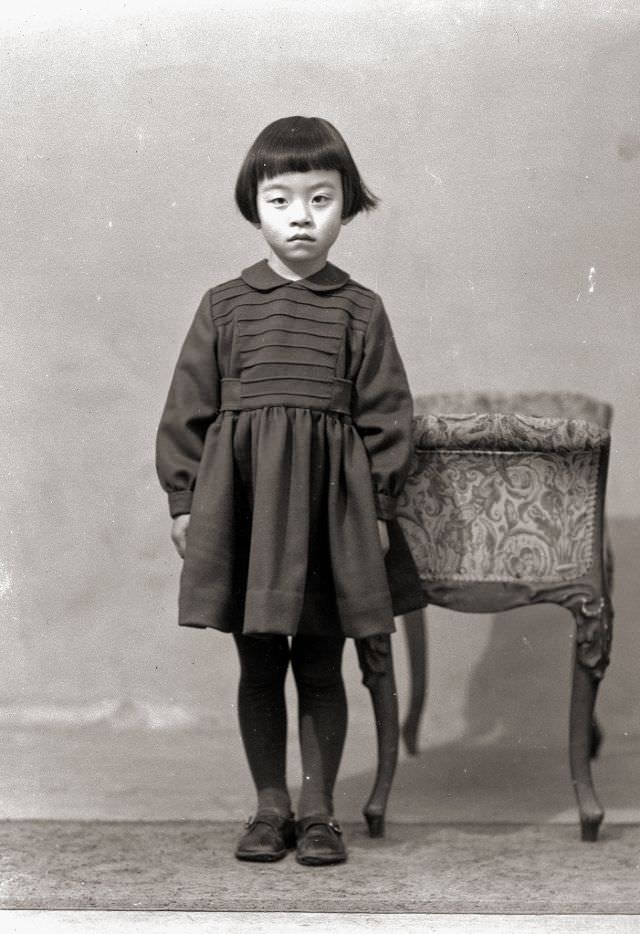 #19 A young Japanese girl in a dress and flats