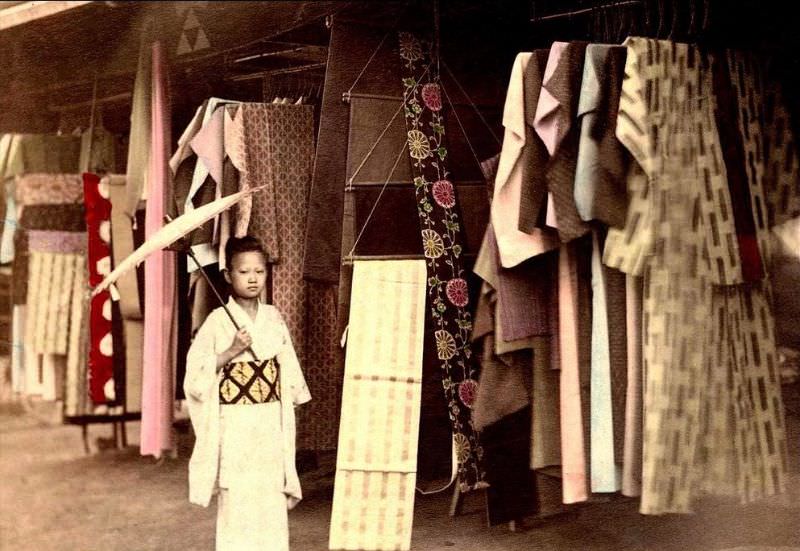 #24 Taking a stroll down kimono lane. An open air clothing market in old Japan