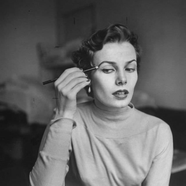 #12 Lillian Marcuson demonstrates the art of applying eye-makeup, Life, January 30, 1950