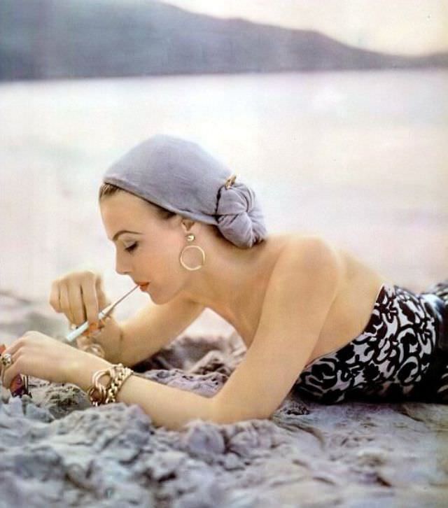 #15 Lillian Marcuson in embroidered piqué suit by Carolyn Schnurer, gold jewelry by Napier, 1951