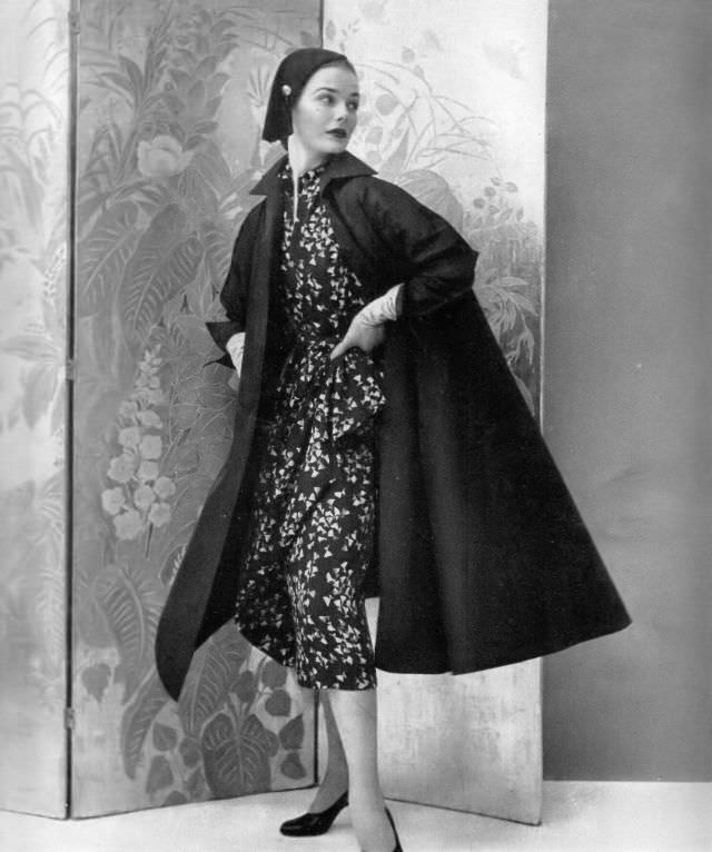 #17 Lillian Marcuson in printed dress with swing coat, 1951