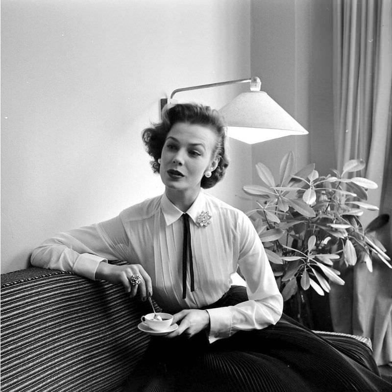 #29 Lillian Marcuson is wearing a pleat-front shirt from Brooks Brothers, 1954