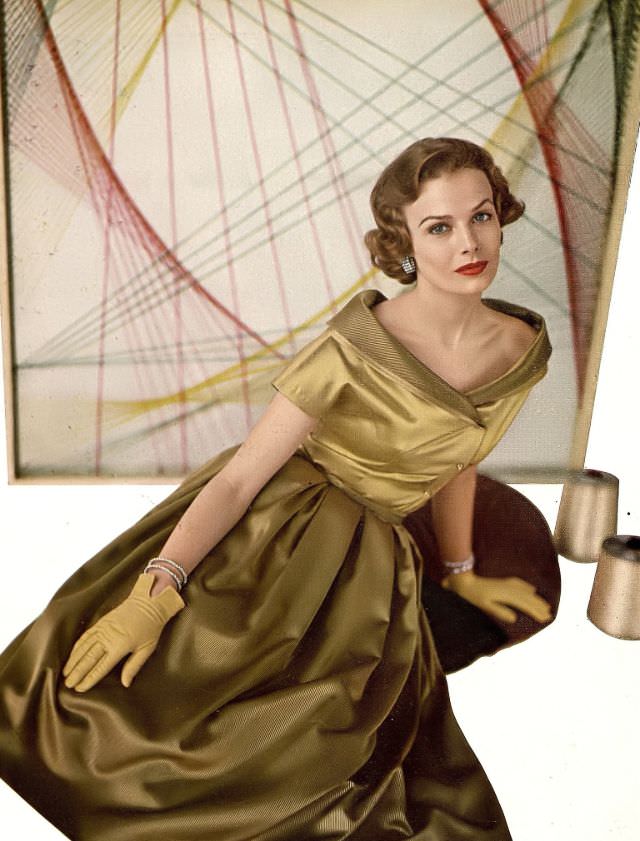#8 Lillian Marcuson in two tones of Celanese rayon satin and satin corduroy, dress by Toni Owen, Harper’s Bazaar, October 1950