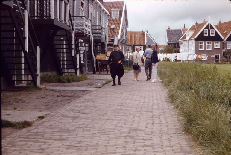 #25 Dutch pedestrians on the street, Marken Island, 1961
