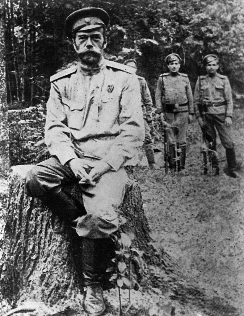 #46 Nicholas II, in exile and guarded by Russian soldiers.