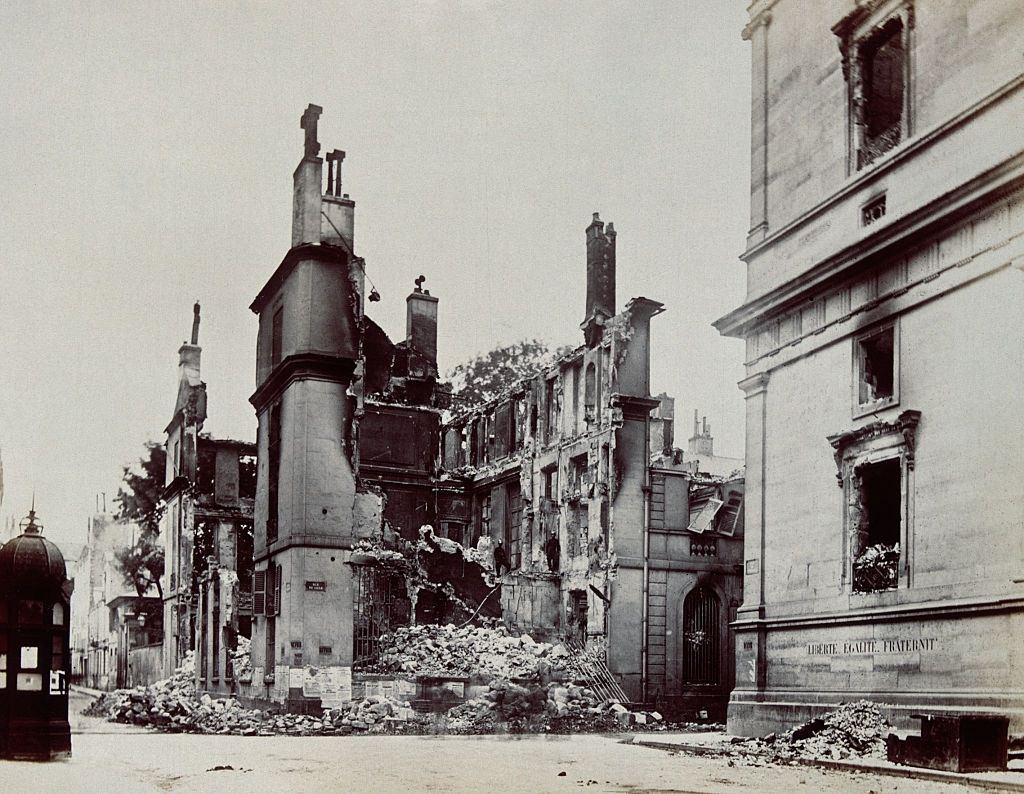 #25 Damaged buildings on the Rue de Lille in Paris during the Franco-Prussian War.
