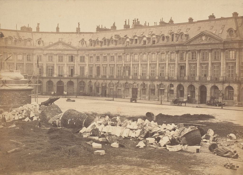 #29 The Vendôme Column after being torn down by the Communards, 1871.