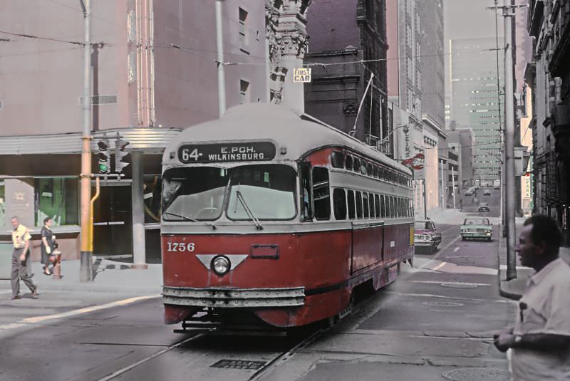 A East Pittsburgh-Willkinsburgcar on 4th Ave. crossing Smithfield Street in downtown Pittsburgh, PA on June 27, 1965