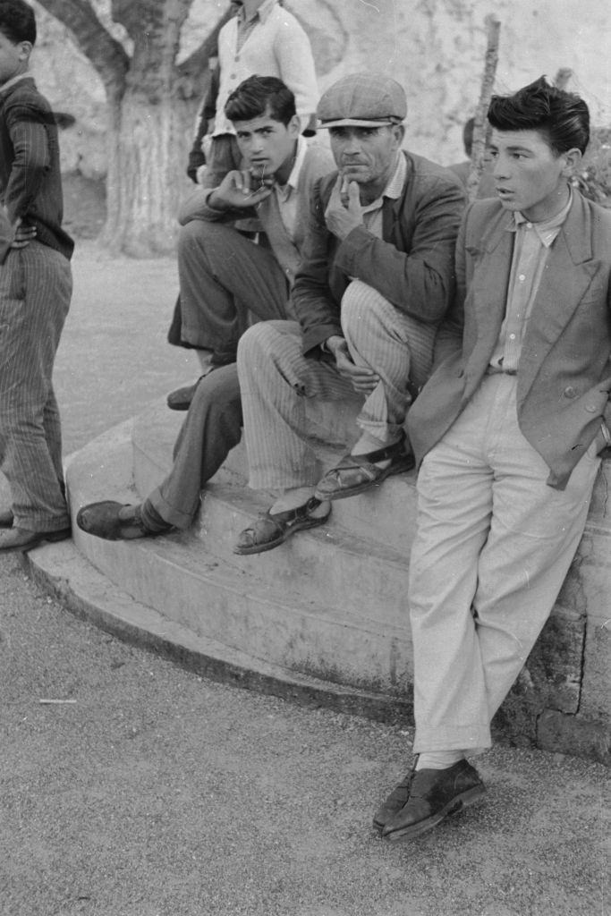#26 Men sitting in Rhodes, 1954.