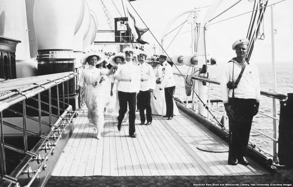 #29 The grand duchesses striding across the deck of the Standart.