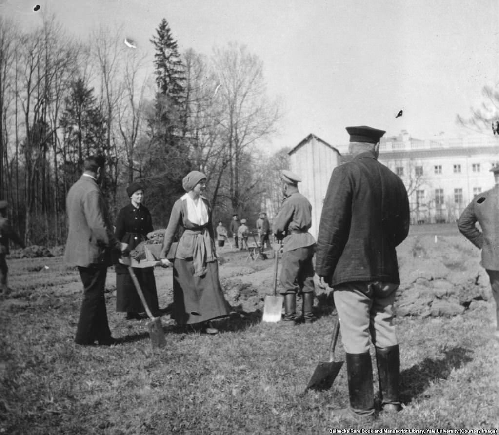 #30 In the months after the 1917 Revolution, Grand Duchess Tatiana helping to dig a vegetable garden while being held in captivity by revolutionaries.