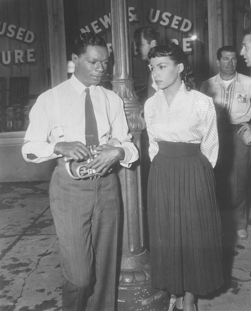 #25 Ruby Dee with Nat King Cole, 1958.