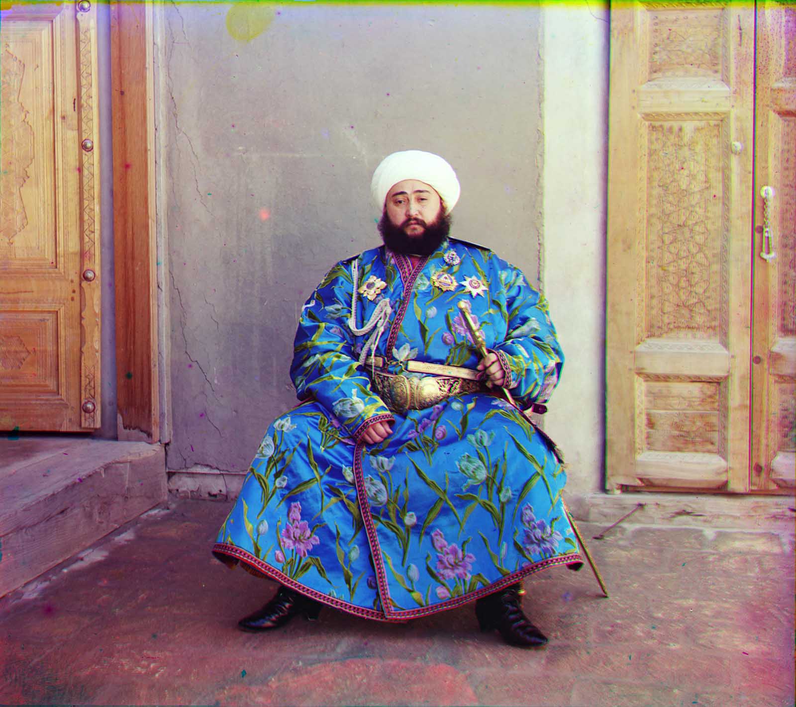 #118 Emir Seyyid Mir Mohammed Alim Khan, the Emir of Bukhara, seated holding a sword in Bukhara, (present-day Uzbekistan), 1910.