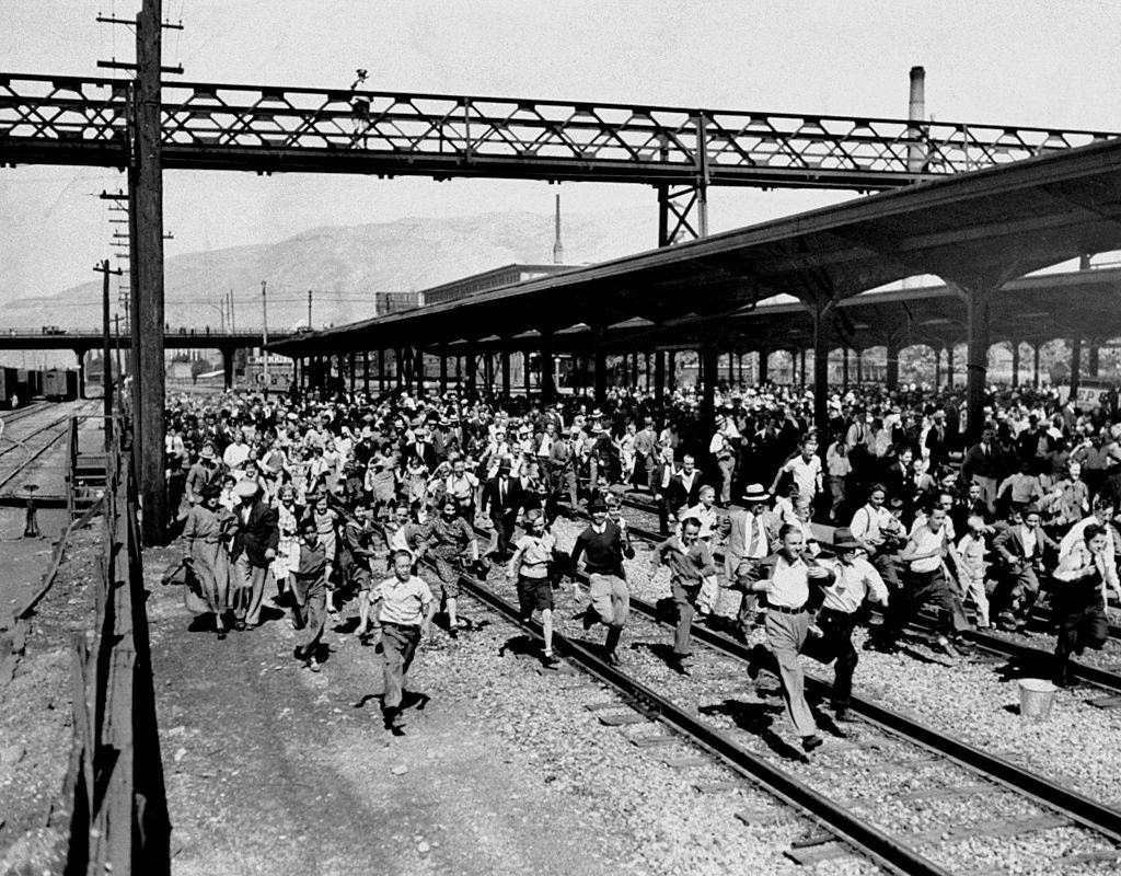 #45 Crowd rushes to see President Franklin D. Roosevelt on his stop in Salt Lake City, 1935.