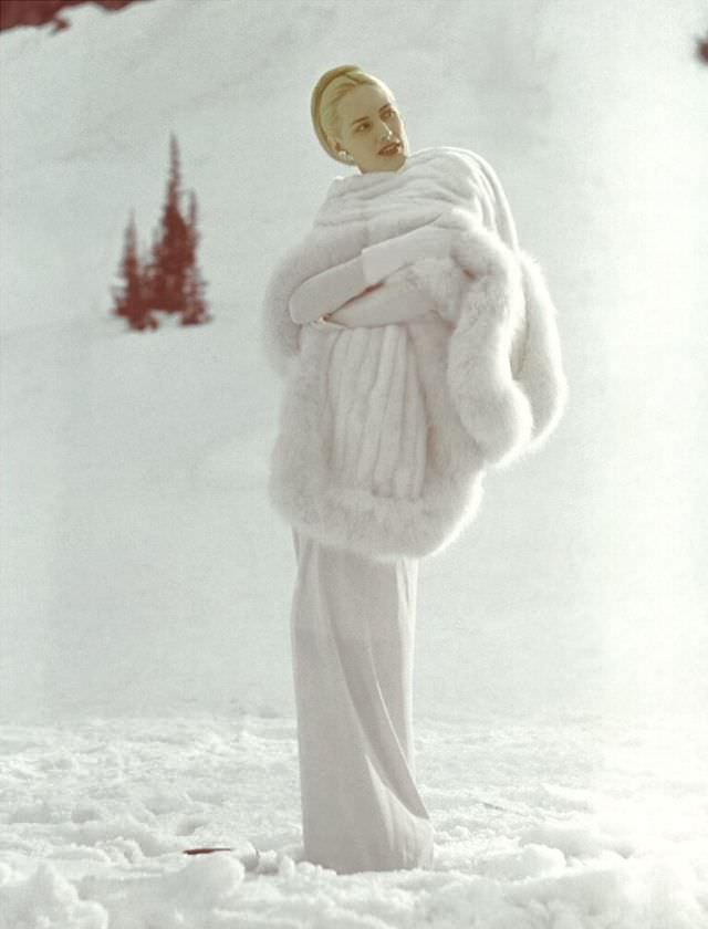 #13 Lily Carlson wearing long white stole of Russian ermine and Russian fox, Vogue, August 1946