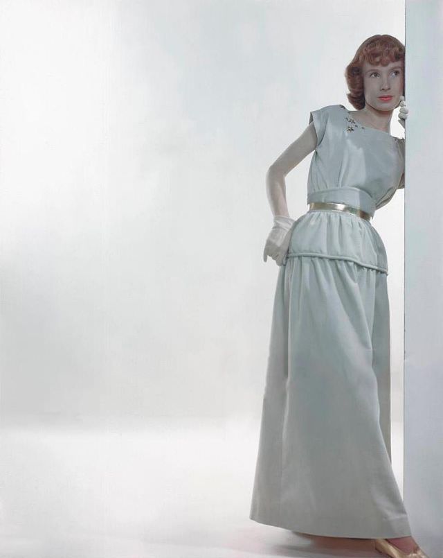 #16 Model in corduroy white scoop-necked blouse with white skirt, both by Korday, Glamour, 1946