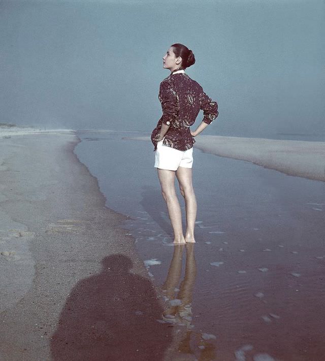 #17 Model is wearing batik printed shirt over white shorts, 1946