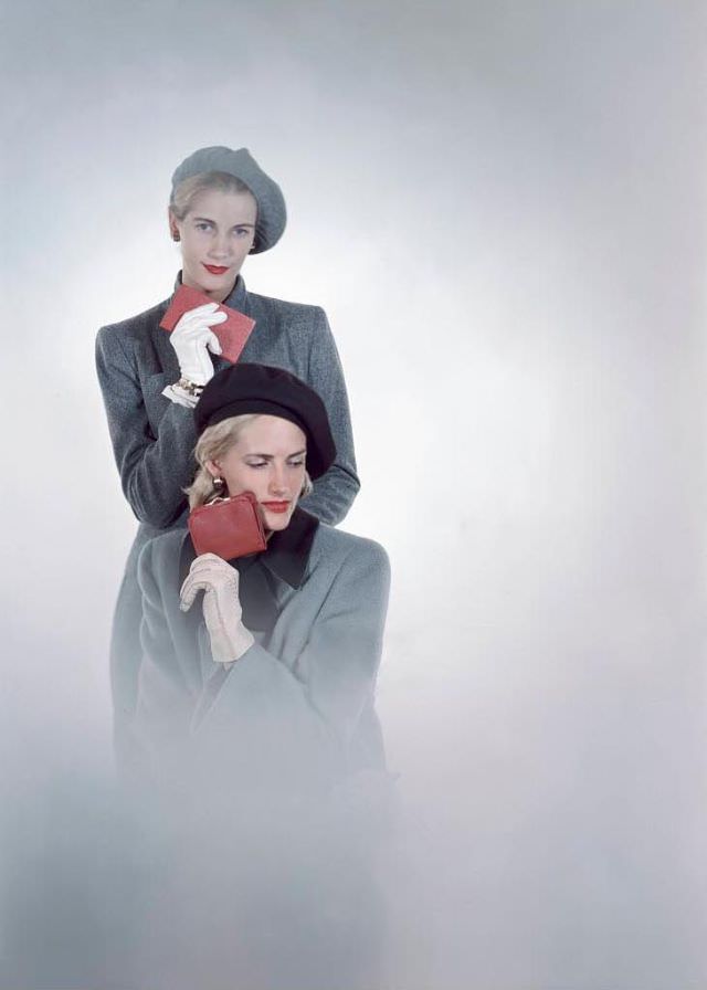 #21 Models one standing holding a cigarette case, the other holding red Morocco purse, both wear white hand-stitched pig skin gloves, Glamour, 1946