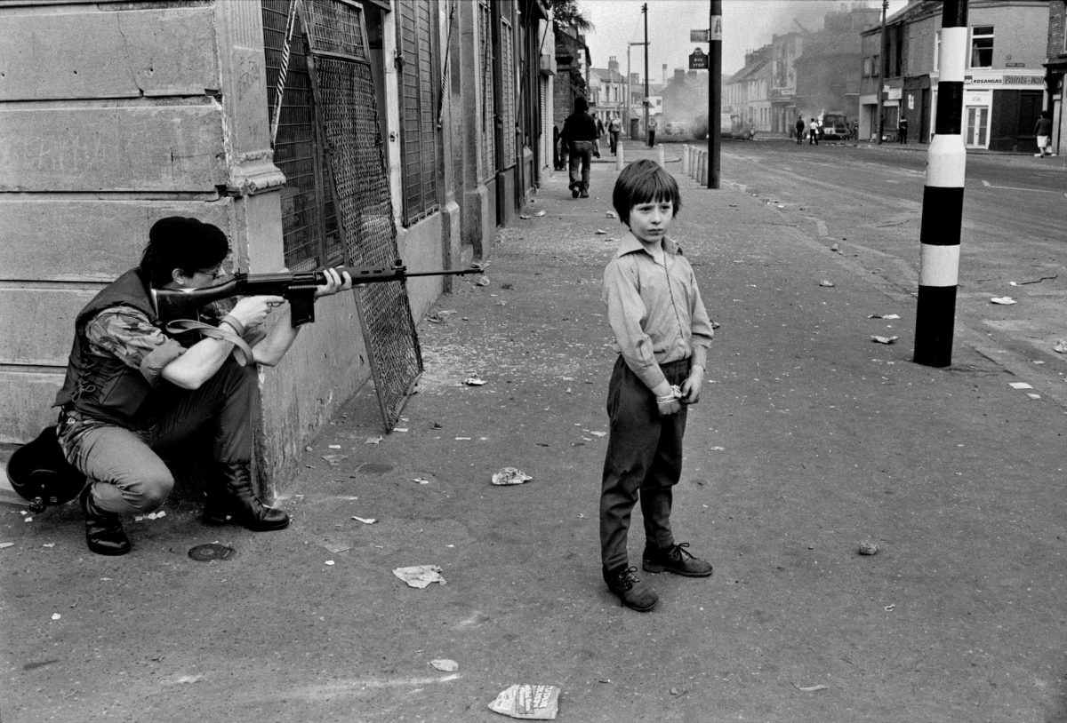 #9 Soldier pointing rifle, bottom of Clonard Street, Belfast, 1978