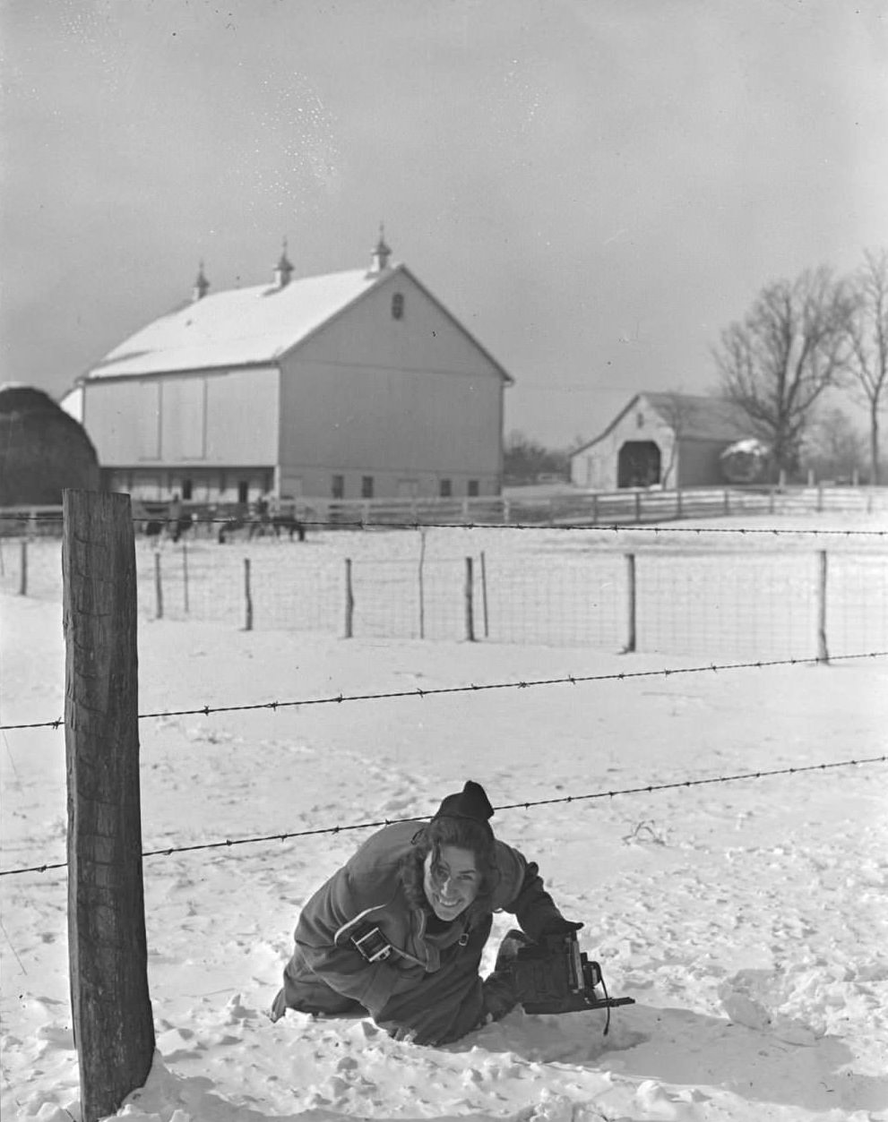 #24 Marion Post Wolcott with Rolleiflex camera, Montgomery County, Maryland, January 1940.