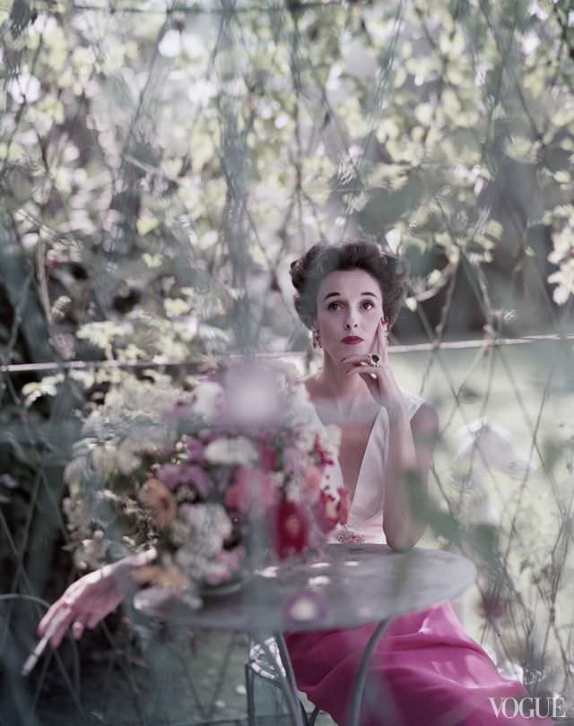 #16 Babe Paley at her Kiluna Farm home in Manhasset, Long Island, in a Mainbocher evening dress, December 1, 1952