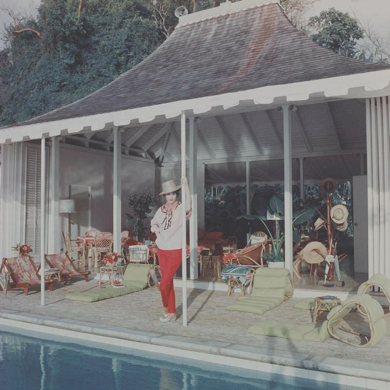 #20 Babe Paley beside the pool at her cottage in Round Hill, Jamaica, 1959