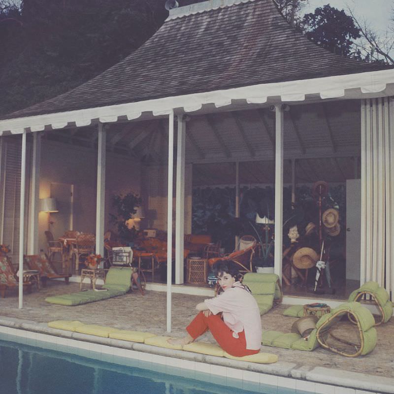 #21 Babe Paley beside the pool at Round Hill, her villa in Jamaica, 1959