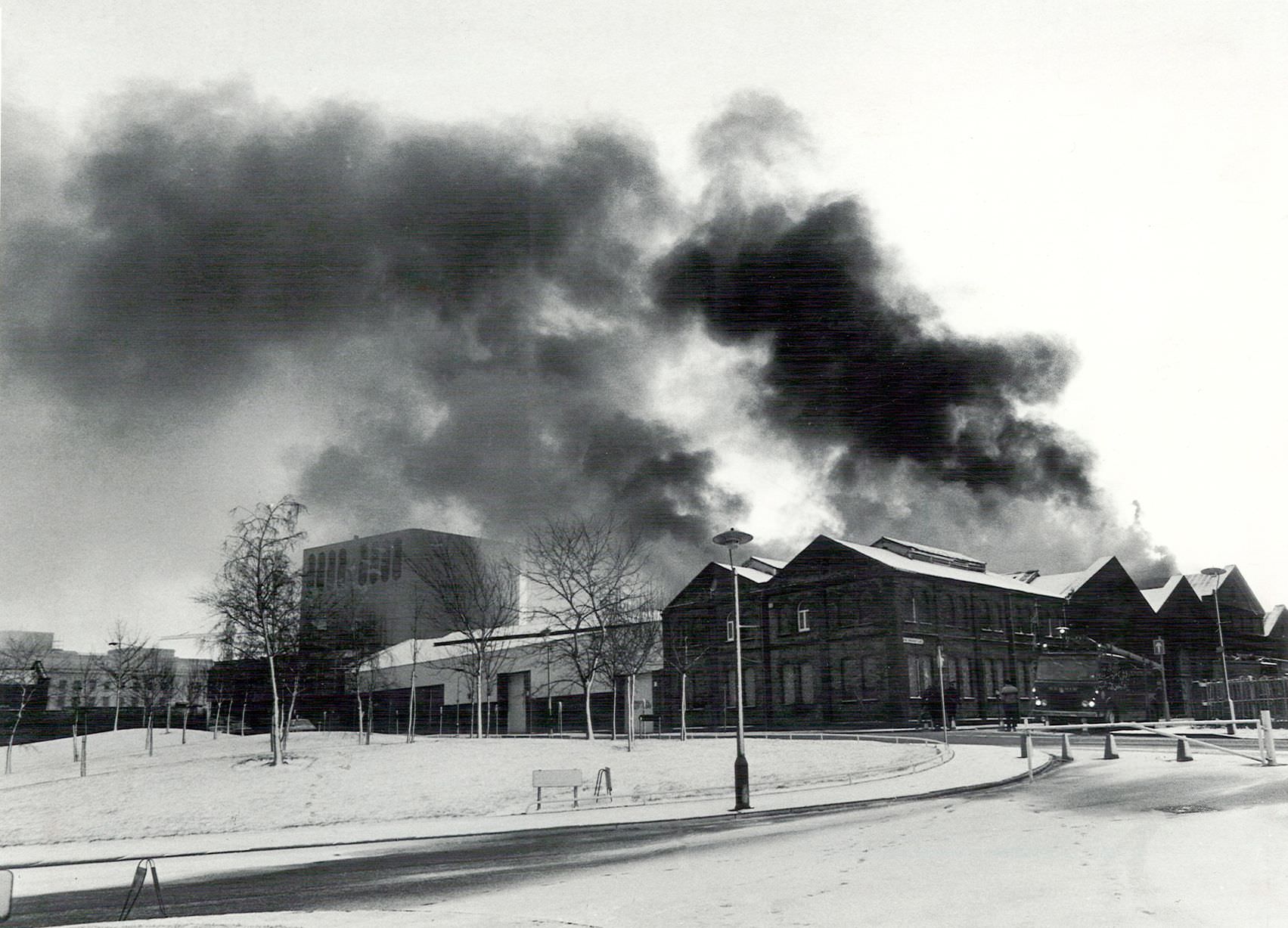 #16 Smoke darkens the wintry scene as fire rages through Bingley Hall, Broad Street, Birmingham 14th January 1984.