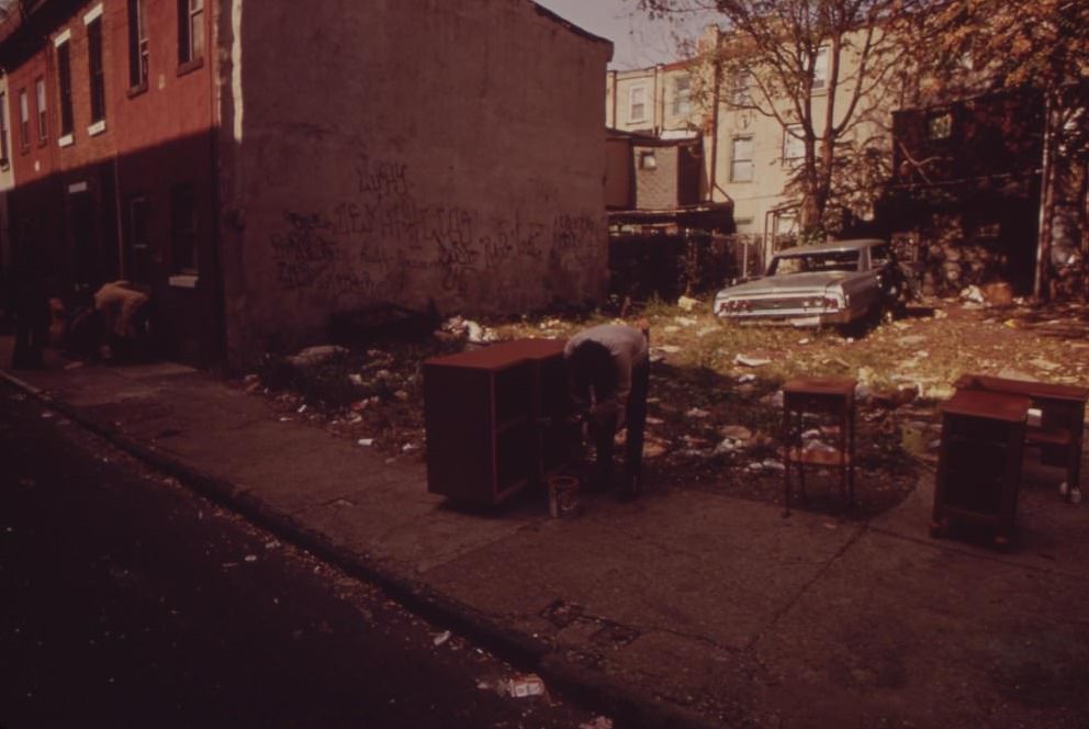 #9 Abandoned Car In Trash-Strewn Lot, August 1973