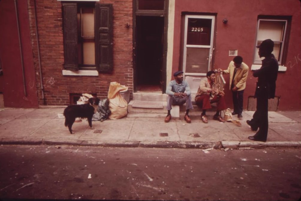 #6 North Philadelphia Jobless Blacks. Man Standing At Right Is Gerald “Heat Wave” Jones, Who Works For “the Network”, August 1973
