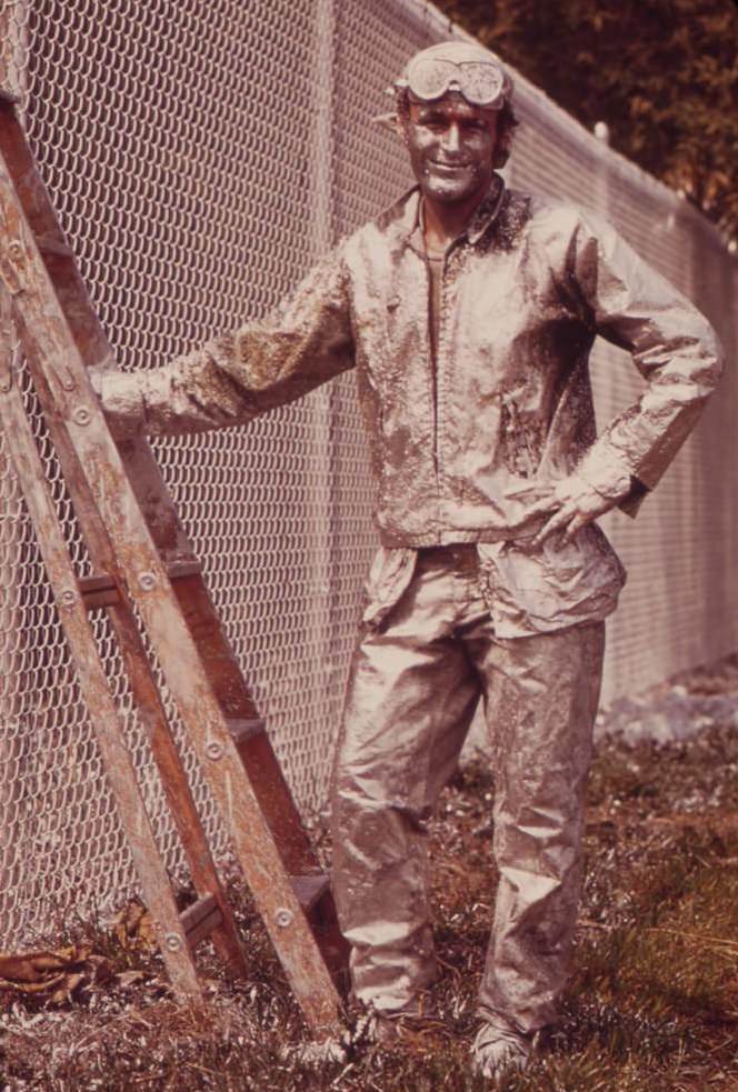 #94 Painter Working On Chain Link Fence, August 1973
