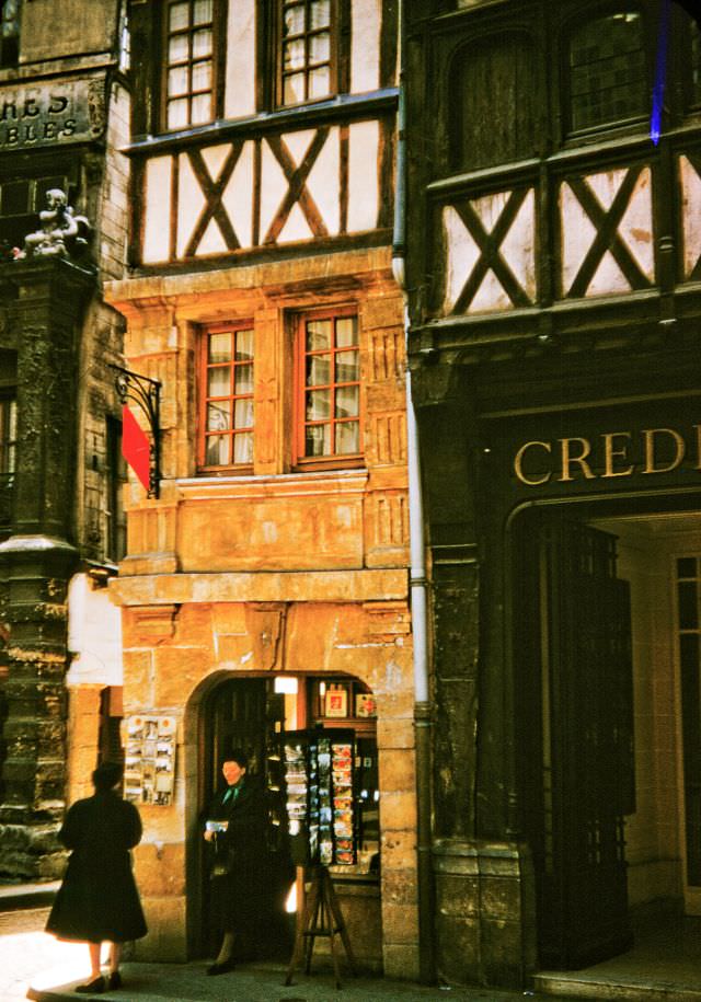 #78 Street scene, 97 Gros Horloge (Big Clock) Street, France, 1956