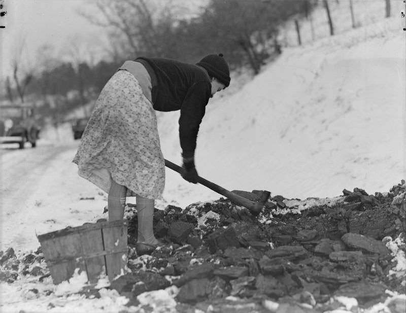 #40 Scott’s Run, West Virginia. Woman gathering coal, March 1937
