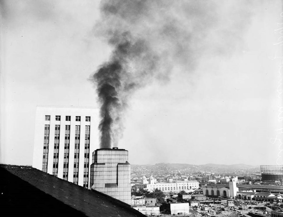 #107 Smoke coming out of stack on 9th floor roof of City Hall, 1950