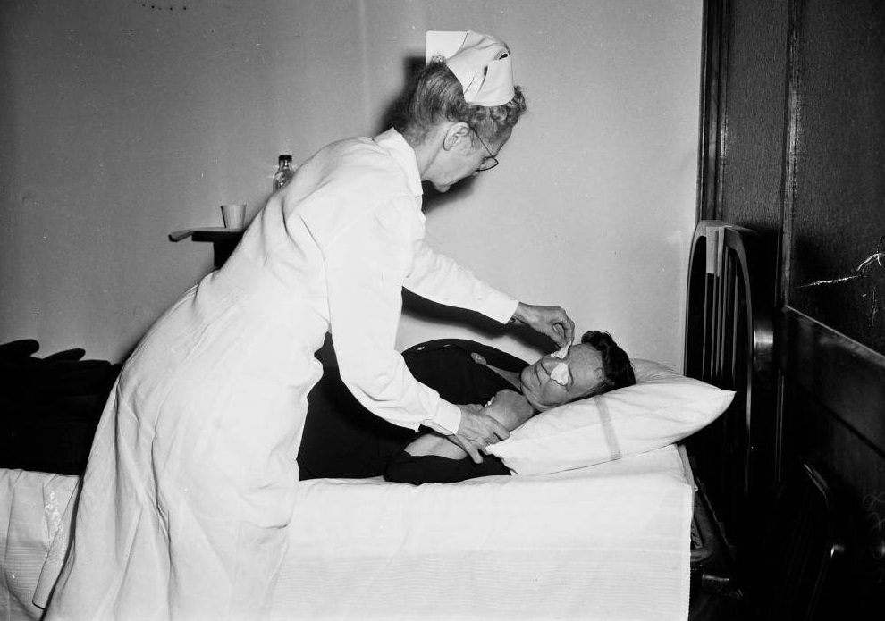 #58 Nurse Ruth Bergman taking care of Mrs. John Wickham, 1949