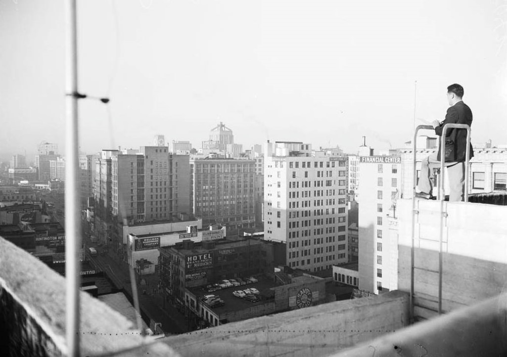 #60 George Ichien (Air Pollution Control Inspector, atop Cecil Hotel looking for violators, 1948
