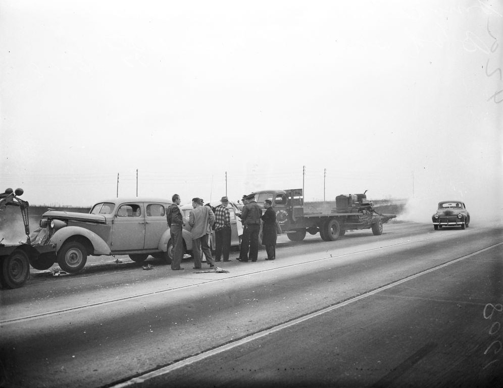 #69 General views of autos and trucks piled up in freak accident on east side of Lincoln Boulevard, south of Manchester Avenue, 1948