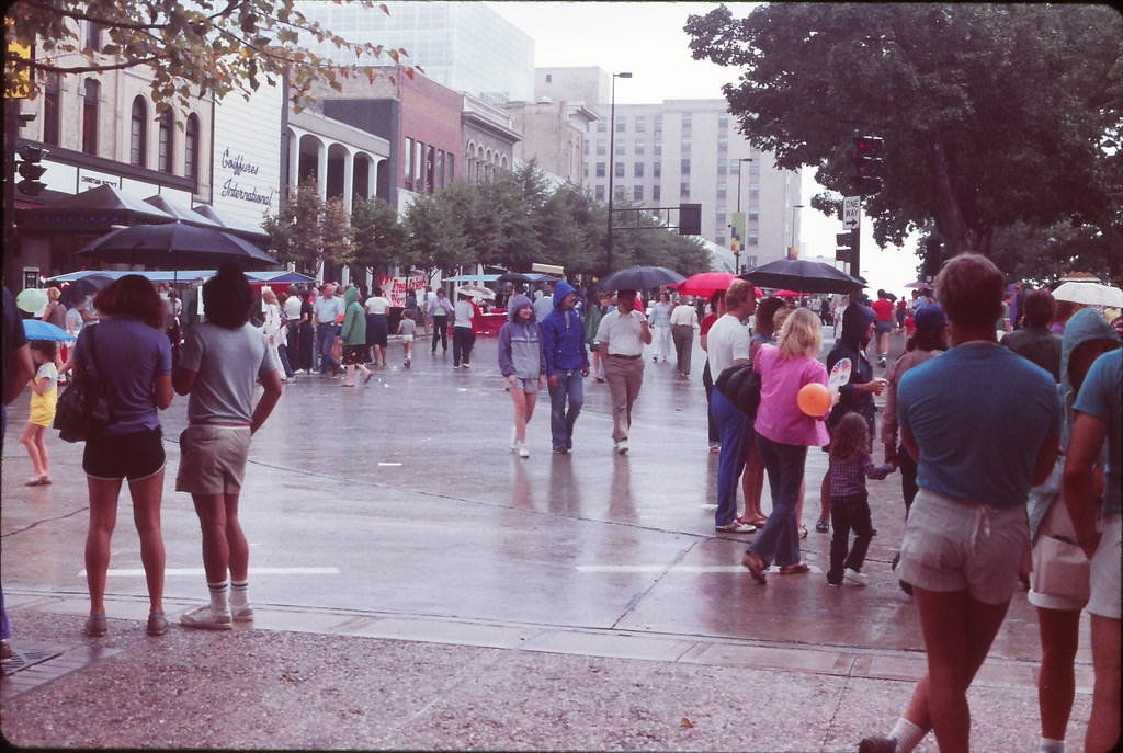 #84 Homecoming in the rain, Capitol Square, Madison, Fall 1984