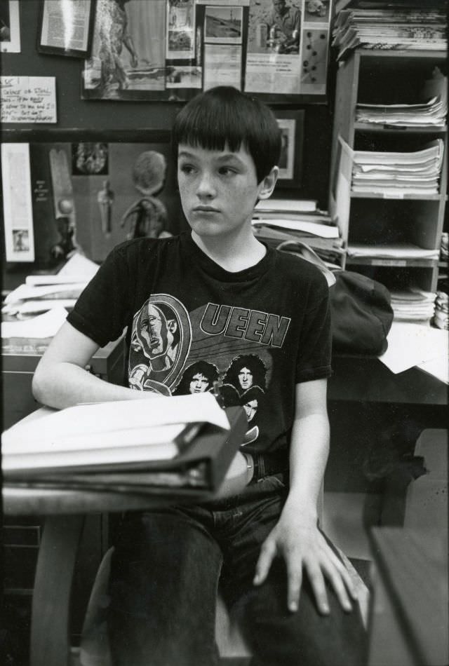 #9 Boy in Queen t-shirt in classroom
