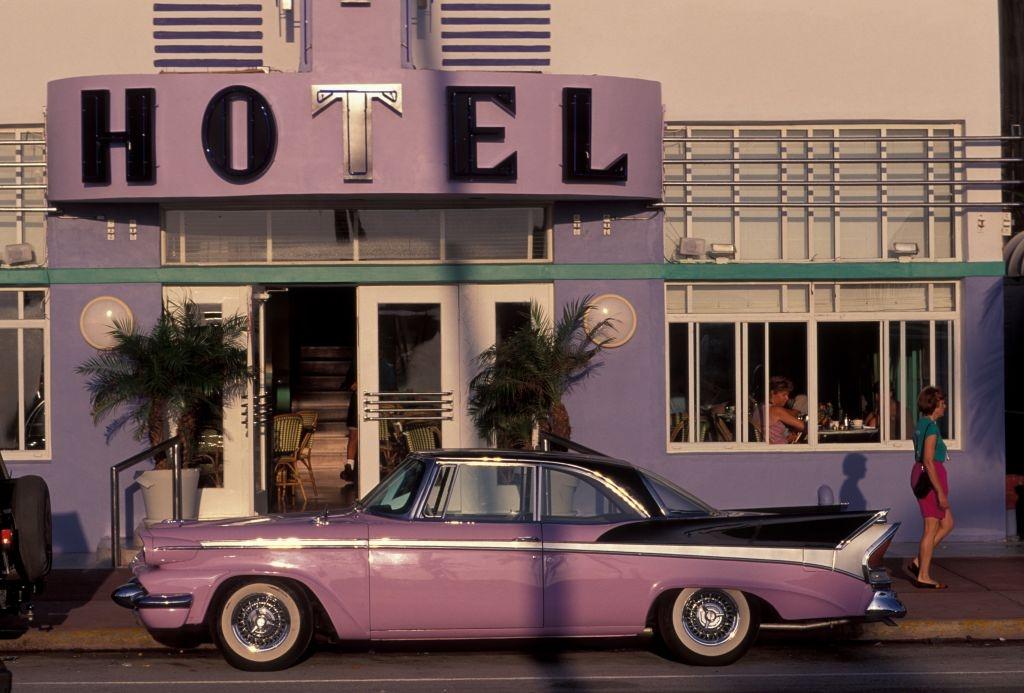#24 The entrance to the Colony Hotel on Ocean Drive, with its permanent accessory, Miami, 1990.