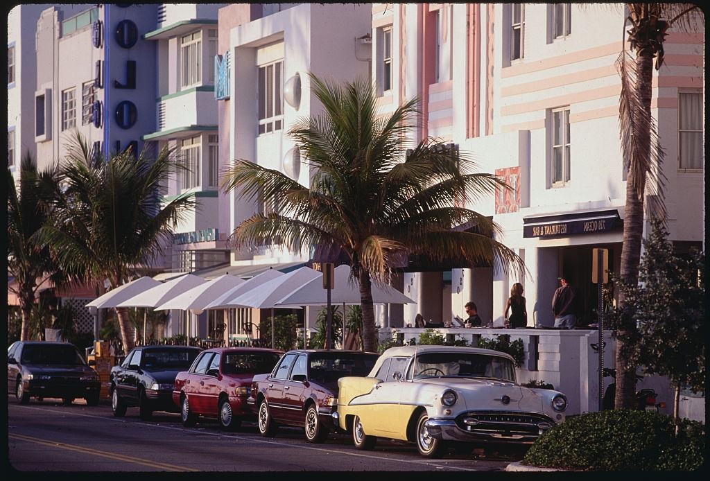 #43 Automobiles Outside Artistically Decorated Restaurant, 1992.
